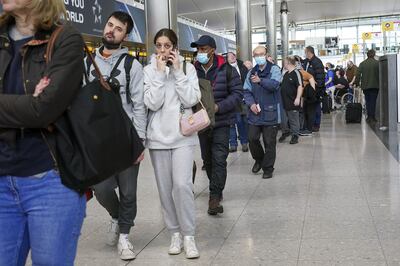 Travellers queue for security checks at Heathrow Terminal 2 on Monday. The airport has been blighted by mass flight cancellations and extended waiting times over the past three weeks. PA