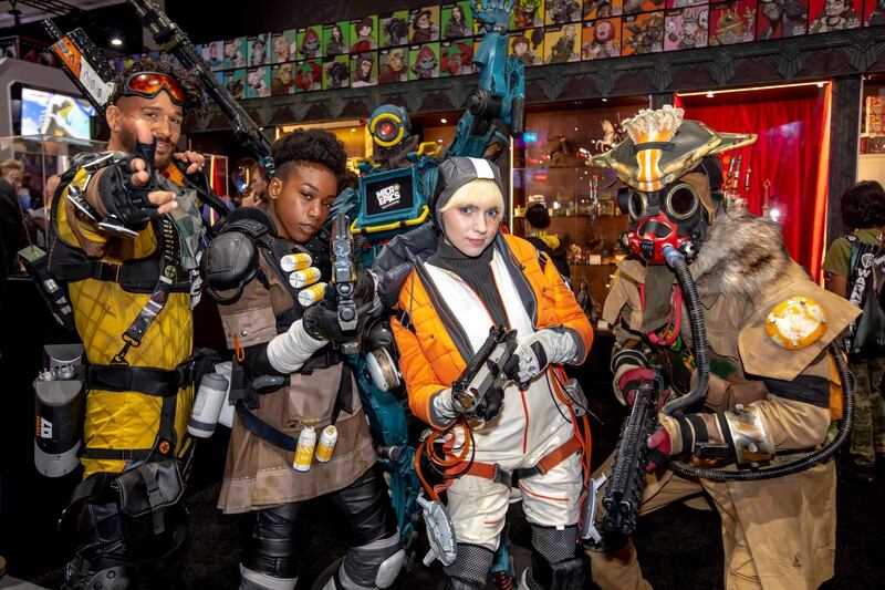 From left: Kevin Morra "Mirage," Louisette St. Fort "Bangalore", Gabrielle Zverina "Watson" and Chris Guidotti "Bloodhound" from Toronto pose as characters from Apex Legends. AP Photo
