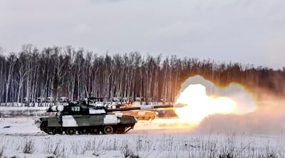 A Russian T-72B3 tank fires during military drills at the Golovenki training ground near Moscow, Russia. AP Photo