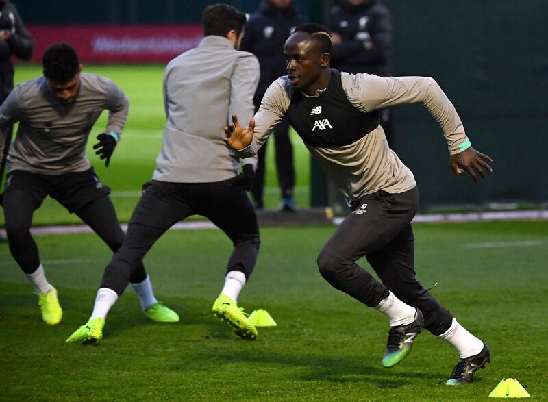 Liverpool's Sadio Mane, right, during a training session at Melwood on the eve of their Champions League match against Genk. AFP