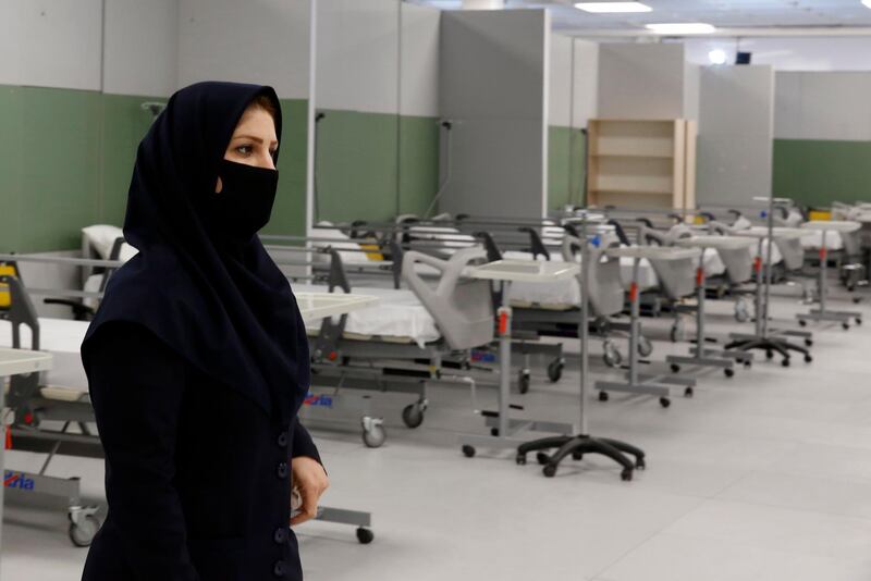 An Iranian woman health inspector checks a temporary emergency hospital in 'Iran Mall'. EPA