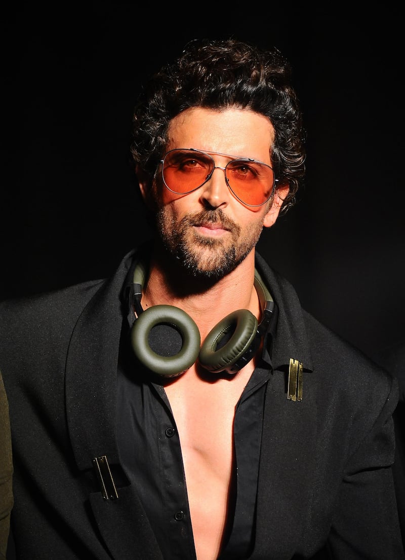 Indian Bollywood actor Hrithik Roshan showcases a creation by designer Nikhil Thampi during the Tech Fashion Tour Season 3 in Mumbai on late September 20, 2017. (Photo by STR / AFP)