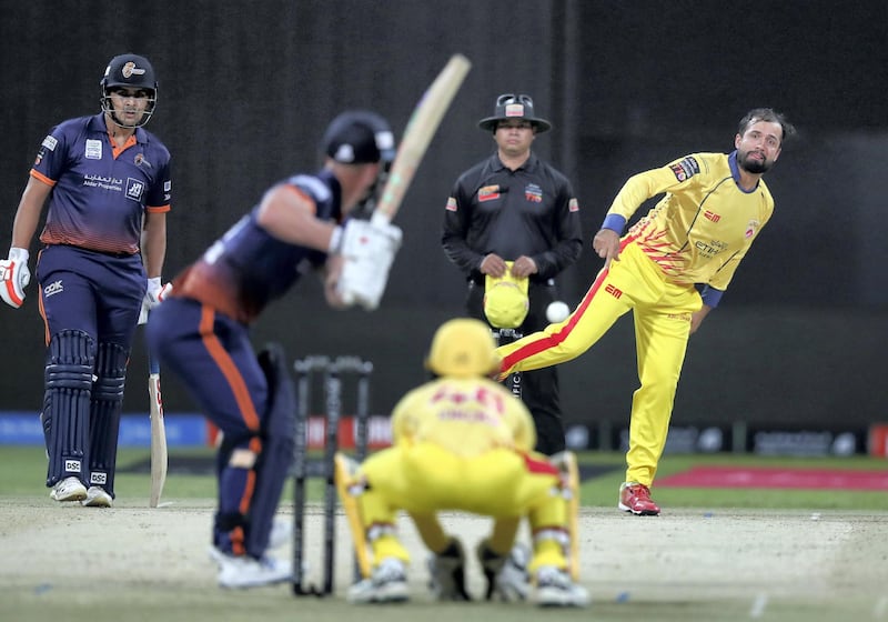 Abu Dhabi, United Arab Emirates - November 18, 2019: Abu Dhabi's Rohan Mustafa bowls during the game between Maratha Arabians and Team Abu Dhabi in the Abu Dhabi T10 league. Monday the 18th of November 2019. Zayed Cricket Stadium, Abu Dhabi. Chris Whiteoak / The National