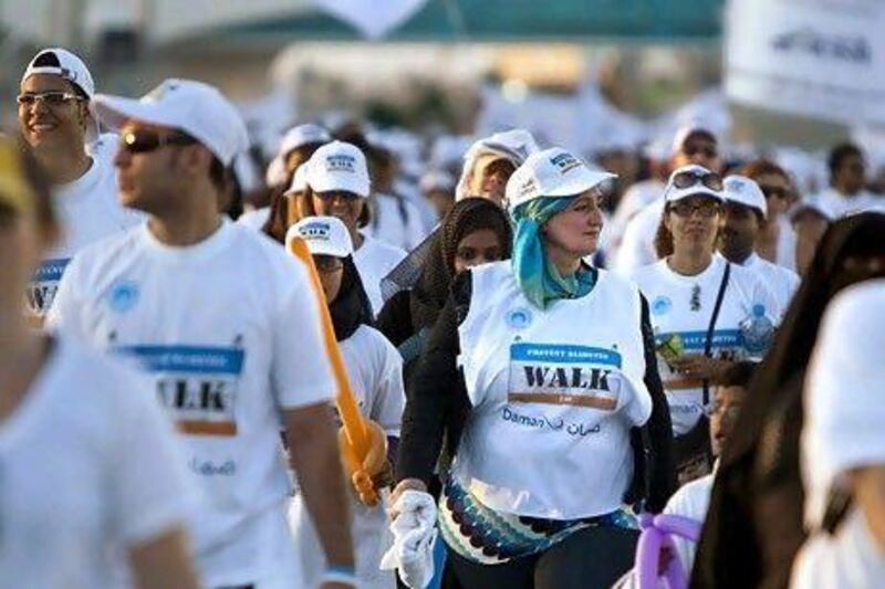 Participants in a walkathon for diabetes prevention on Yas Marina in Abu Dhabi. Diabetes affects 18.7 per cent of the country's adult population. Andrew Henderson / The National