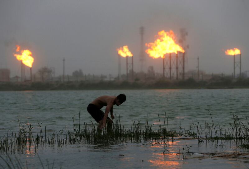 Flames rising from oil refinery pipes at the Shatt al-Arab River in Basra. Reuters