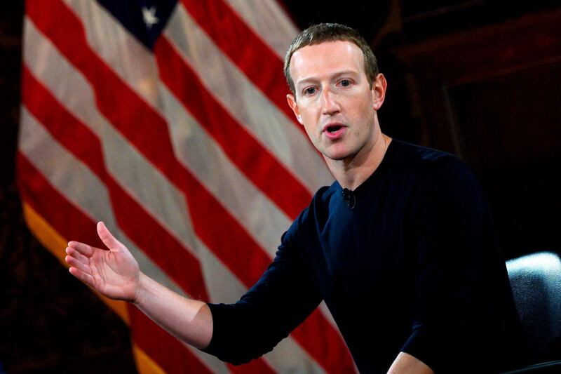 (FILES) In this file photo Facebook founder Mark Zuckerberg speaks at Georgetown University in a 'Conversation on Free Expression" in Washington, DC on October 17, 2019. Facebook chief Mark Zuckerberg has defended his decision not to interfere with posts by US President Donald Trump, US media reported, after the social media giant's hands-off policy sparked outrage and prompted some employees to quit. Social media platforms have faced calls to moderate the president's comments, most recently because of the unrest gripping America in the wake of an unarmed black man's death during arrest as a white policeman knelt on his neck.
 / AFP / ANDREW CABALLERO-REYNOLDS
