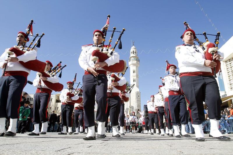 Some Palestinian bagpipers have likened the Scots' desire to break away from the UK to their own struggle for independence. Musa Al Shaer / AFP Photo
