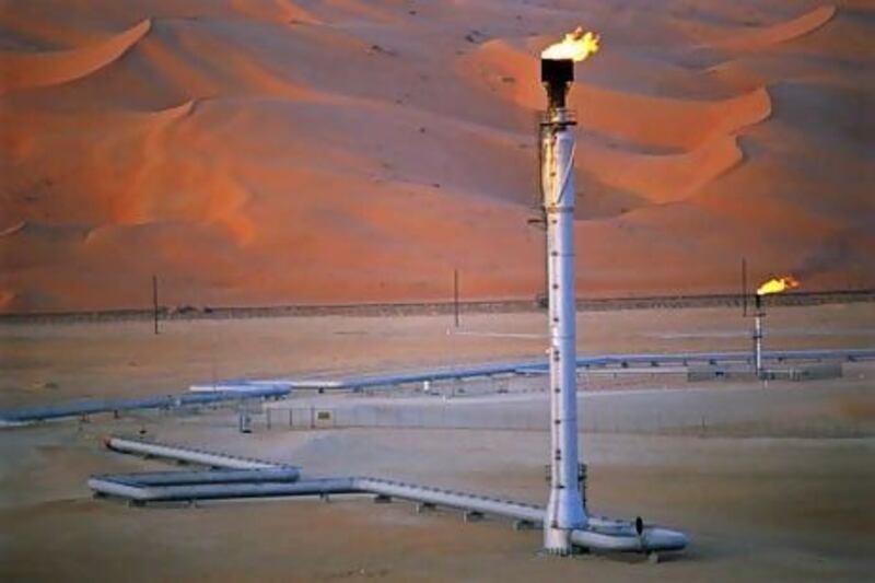 February 2002 --- GOSP2 (Gas Oil Separation Plant) burns off excess gas that cannot be sent to the refinery at the oil field in Shaybah, Saudi Arabia. Credit must read: George Steinmetz/Corbis/arabianEye.com