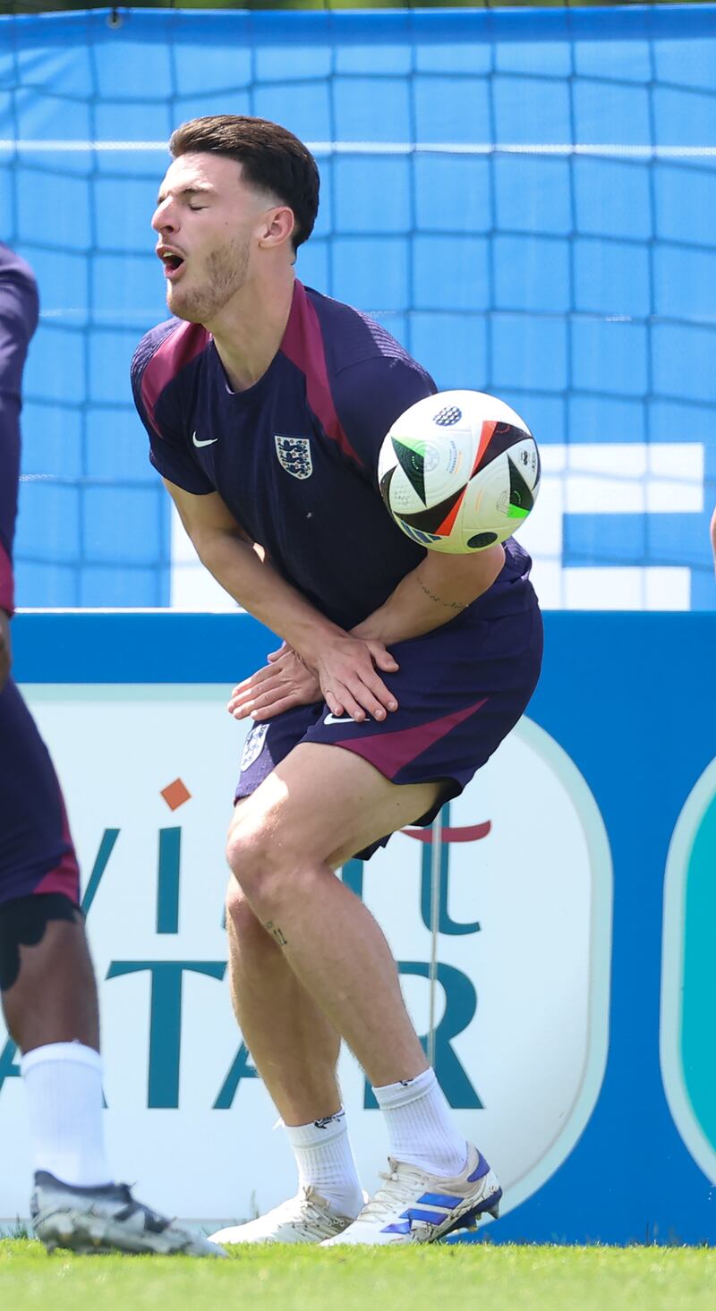 England's Declan Rice takes a painful blow during training. Getty Images