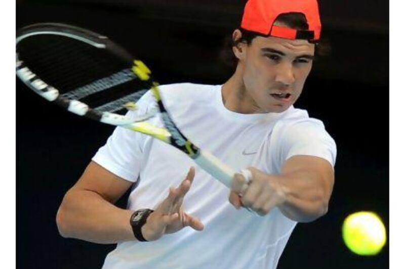 Rafael Nadal looks determined in practice yesterday ahead of the Australian Open.