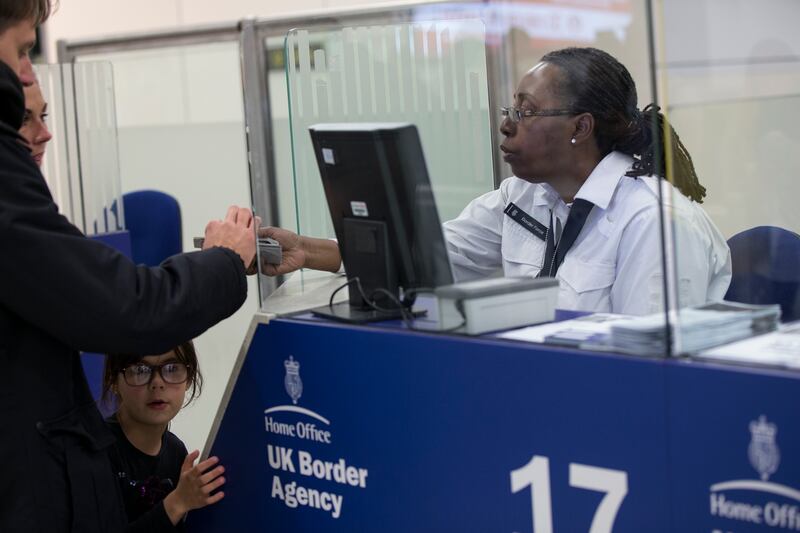 Border Force staff, who check passports at UK airports, plan to strike over Christmas. Getty Images