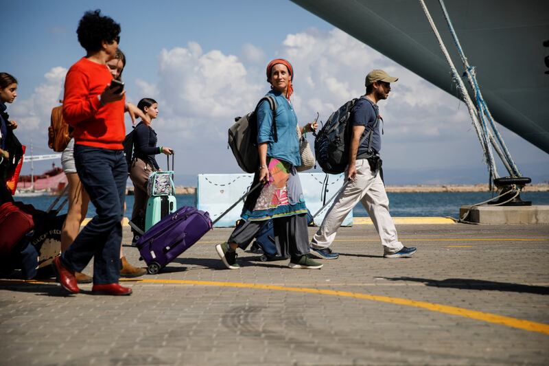 People board a ship for US nationals and their immediate family members in Haifa as they head for Cyprus. Reuters