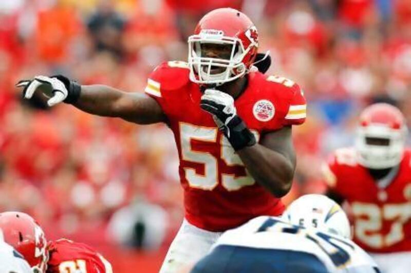 FILE - In this Sept. 30, 2012 file photo, Kansas City Chiefs inside linebacker Jovan Belcher (59) gestures at the line of scrimmage during an NFL football game against the San Diego Chargers in Kansas City, Mo. Police say Belcher fatally shot his girlfriend early Saturday, Dec. 1, 2012, in Kansas City, Mo., then drove to Arrowhead Stadium and committed suicide in front of his coach and general manager. (AP Photo/Ed Zurga, File) *** Local Caption *** Chiefs Player Shooting Football.JPEG-01cfe.jpg