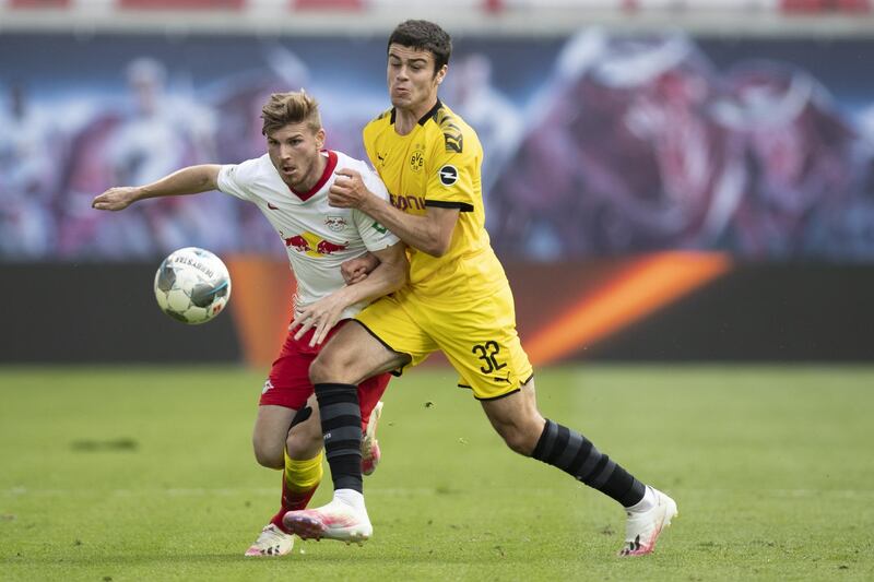 Leipzig's Timo Werner, left, battles for possession with Giovanni Reyna of Borussia Dortmund. Getty