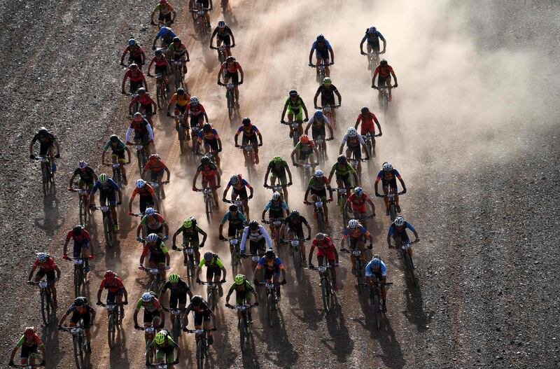 Competitors ride their bikes during Stage 4 of the 14th edition of Titan Desert 2019 mountain biking race between Merzouga and M’ssici, in Morocco. AFP