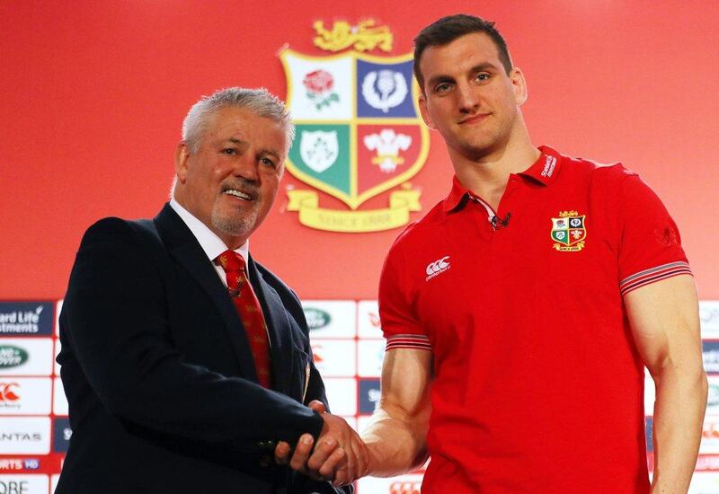 British and Irish Lions head coach Warren Gatland shakes hands with captain Sam Warburton during the tour squad announcement at the Hilton London Syon Park Hotel on April 19, 2017 in London, England. Warren Little / Getty Images