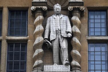 The Cecil Rhodes statue on the facade of Oriel College. EPA