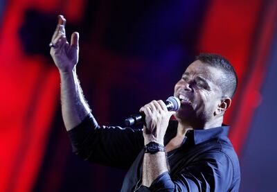 Egyptian pop star Amr Diab performs at Dubai's Coca-Cola Arena on June 18. AP