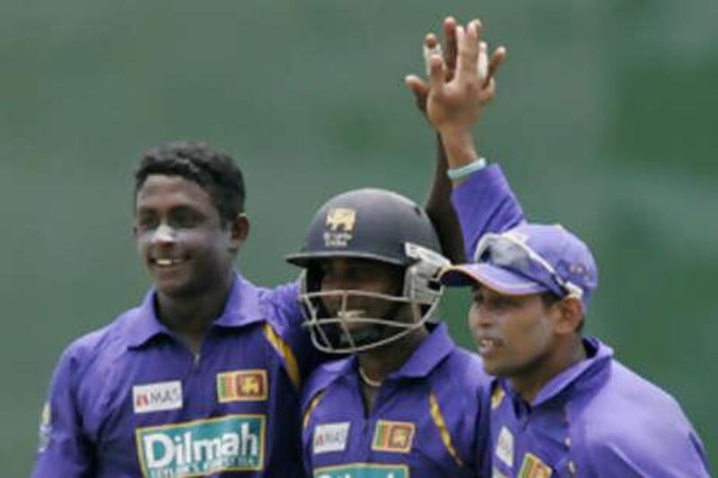 Chamara Silva, centre, has played 102 internationals for Sri Lanka. Agencies