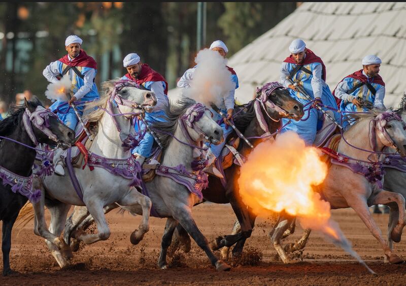 Horse riders perform during the 23rd Hassan II Trophy of Traditional Equestrian Arts (Tbourida) in Rabat, Morocco. EPA