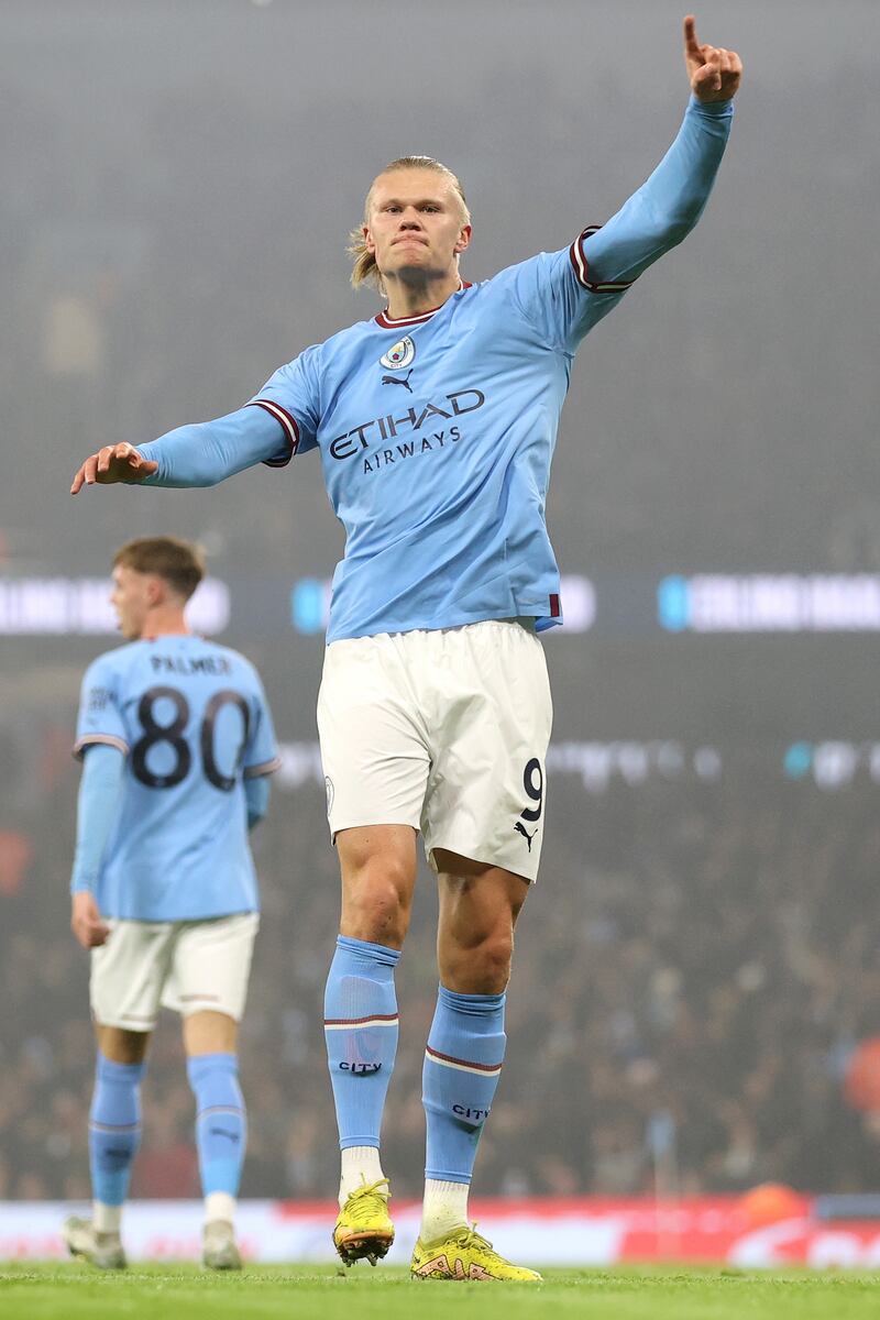 24) Haaland celebrates scoring the opening goal in the 3-2 League Cup fourth round win against at Liverpool at Etihad Stadium on December 22, 2022. Getty