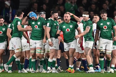 Ireland players celebrate after team mate Finlay Bealham scored a try against England during a Six Nations international rugby match at Twickenham in London, Britain, 12 March 2022.   EPA / ANDY RAIN