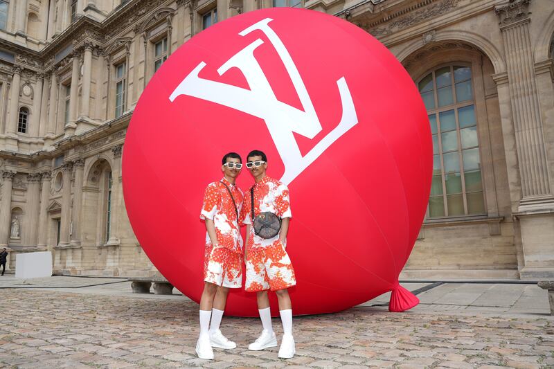 Emirati twins Mohammed and Humaid Habdan attend the Louis Vuitton show. Getty Images For Louis Vuitton