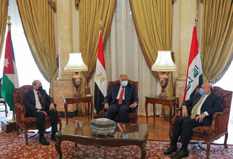 Egypt's Foreign Minister Sameh Shoukry met Jordanian counterpart Ayman Safadi and Iraqi counterpart Fouad Hussein at Al Tahrir Palace AFP