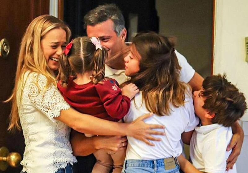 Handout picture posted on October 25, 2020 on the Instagram account of @leopoldolopezoficial, of Venezuelan high-profile opposition politician Leopoldo Lopez greeting his wife Lilian Tintori (L) and their sons in Madrid. Venezuelan opposition figure Leopoldo Lopez, who had been sheltering at the Spanish ambassador's residence in Caracas for 18 months, arrived Sunday in Madrid after fleeing his home country, his father told AFP.  - RESTRICTED TO EDITORIAL USE - MANDATORY CREDIT "AFP PHOTO / Instagram account @leopoldolopezoficial / handout" - NO MARKETING - NO ADVERTISING CAMPAIGNS - DISTRIBUTED AS A SERVICE TO CLIENTS

 / AFP / Instagram account @leopoldolopezoficial / - / RESTRICTED TO EDITORIAL USE - MANDATORY CREDIT "AFP PHOTO / Instagram account @leopoldolopezoficial / handout" - NO MARKETING - NO ADVERTISING CAMPAIGNS - DISTRIBUTED AS A SERVICE TO CLIENTS

