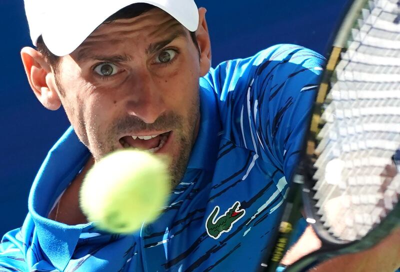 Novak Djokovic of Serbia warms up before playing Roberto Carballes Baena of Spain in their opening match at the US Open. AFP