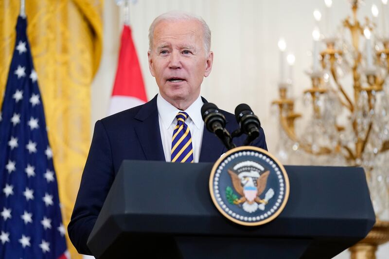 US President Joe Biden said "we'll see" if Russia follows through on its promise to reduce its military forces in Ukraine. AP