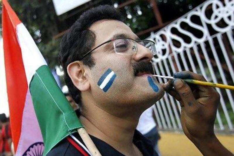 An Indian fan has his face painted before the start of an international friendly soccer match between Argentina and Venezuela last week. Reuters