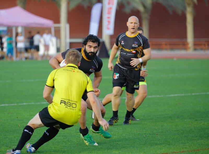 Al Ain Amblers (black) are enjoying their switch to rugby league this season. Victor Besa for The National