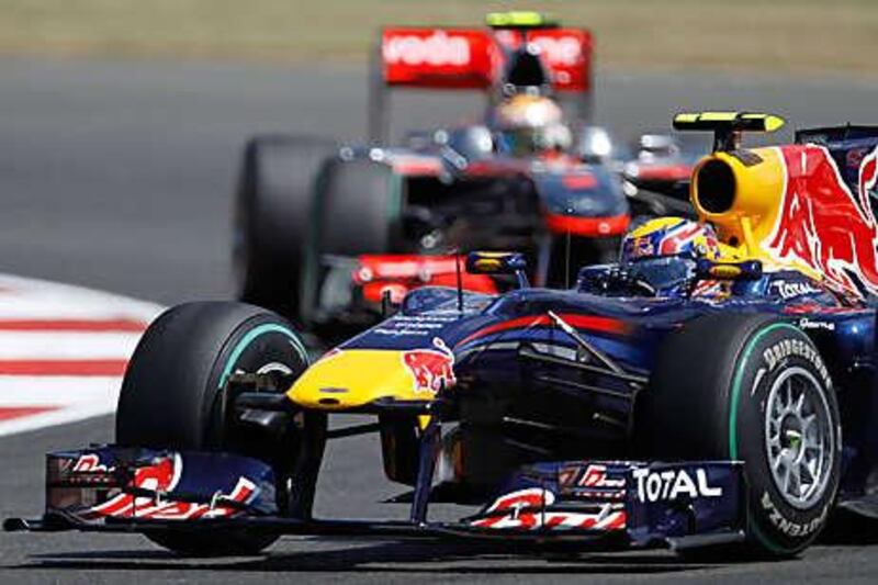 The Red Bull driver Mark Webber was angry that his team had appeared to favour Sebastian Vettel but put that behind him to win Sunday's race at Silverstone.