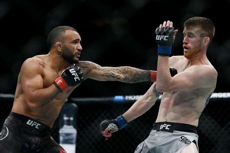 SUNRISE, FLORIDA - APRIL 27: John Lineker of Brazil punches Cory Sandhagen during their bantamweight bout at UFC Fight Night at BB&T Center on April 27, 2019 in Sunrise, Florida.   Michael Reaves/Getty Images/AFP