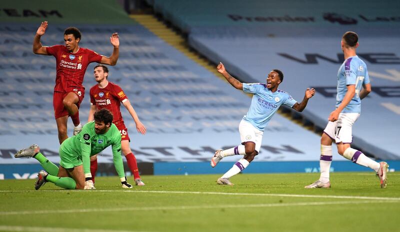 Manchester City's Raheem Sterling, second right, celebrates after his team's fourth goal. AP