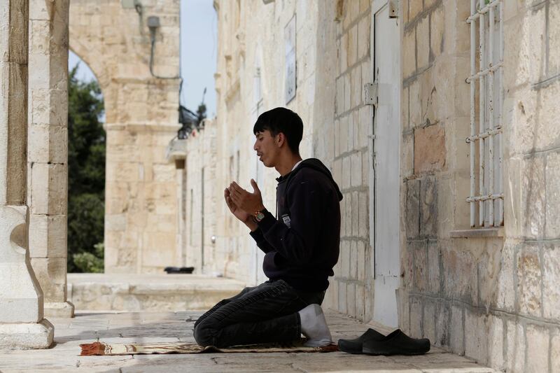 A man takes part in the final Friday prayers of Ramadan at the Dome of the Rock shrine in the Al Aqsa Mosque compound, in the Old City of Jerusalem, on May 7. AP Photo