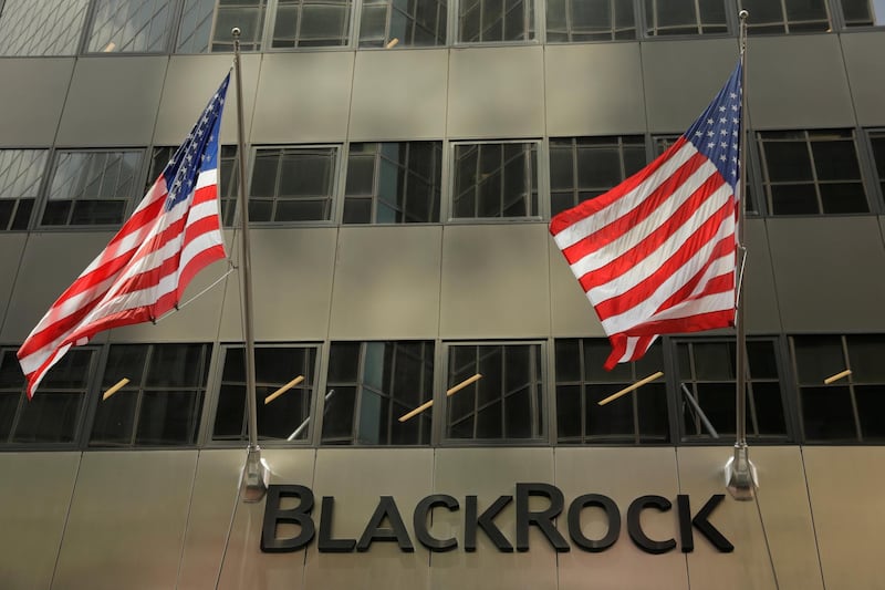 FILE PHOTO: A sign for BlackRock Inc hangs above their building in New York U.S., July 16, 2018. REUTERS/Lucas Jackson/File Photo                  GLOBAL BUSINESS WEEK AHEAD