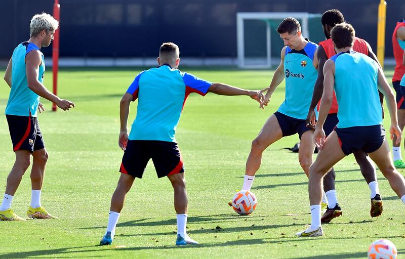 Robert Lewandowski trains with teammates. AFP