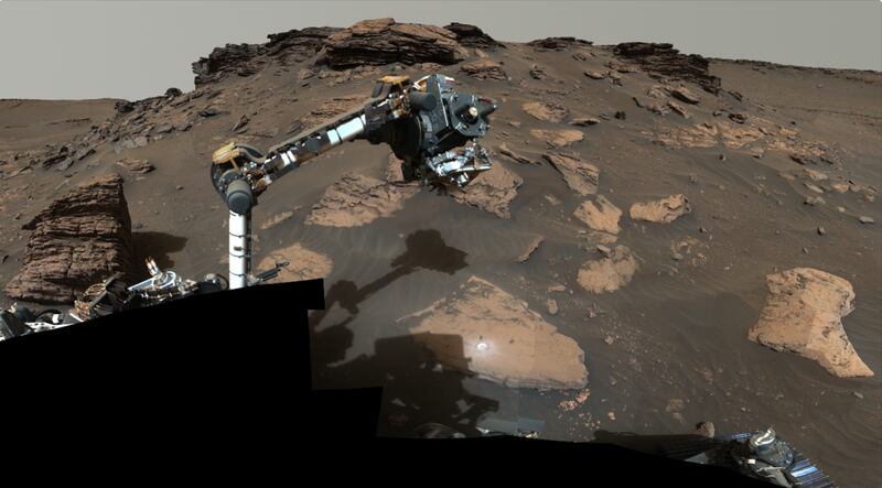 Nasa’s Perseverance rover puts its robotic arm to work at a rocky outcrop called Skinner Ridge in the Jezero Crater on Mars. Photo: Nasa