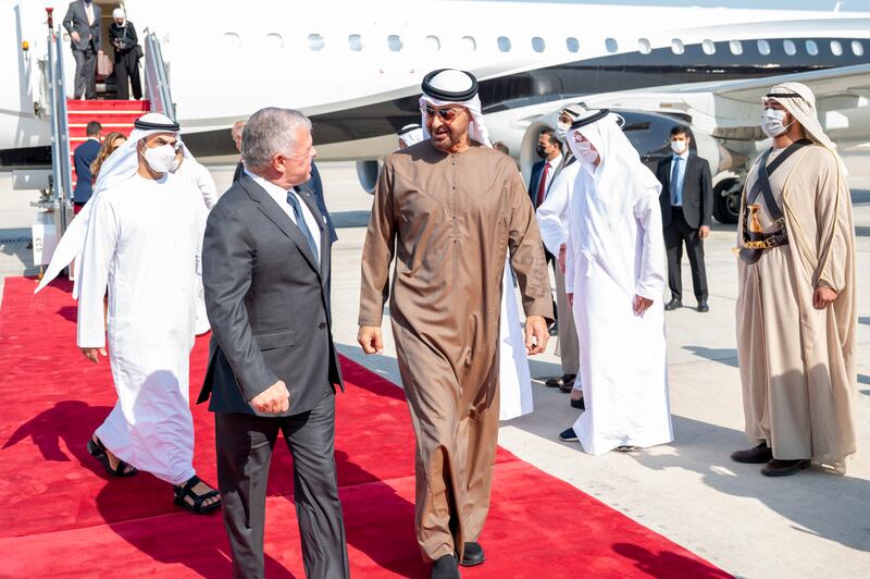 Sheikh Mohamed receives King Abdullah at Al Bateen Airport in Abu Dhabi.