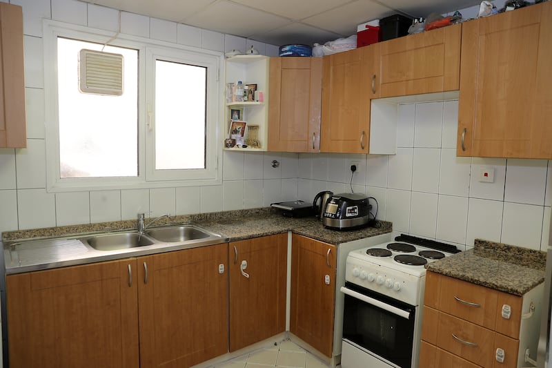 The kitchen is completely enclosed from the rest of the apartment, a rarity in Dubai. Pawan Singh / The National
