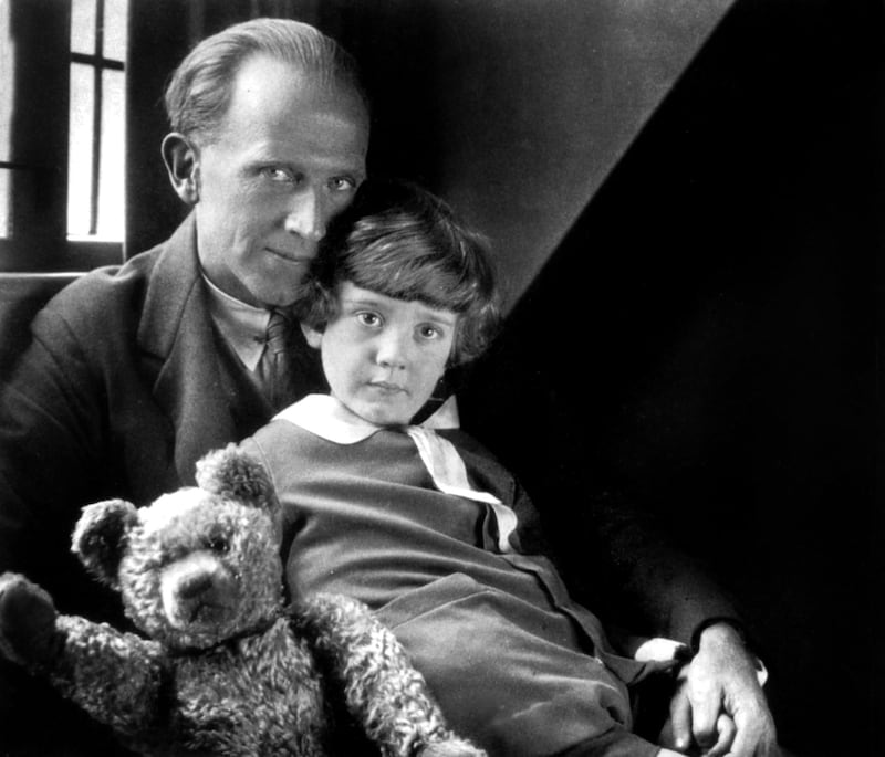 English author A.A. Milne, (1882-1956), with his son Christopher Robin and the teddy bear, Pooh Bear at Cotchford Farm, their home in east Sussex, 1926. (Photo by Howard Coster/Apic/Getty Images)
