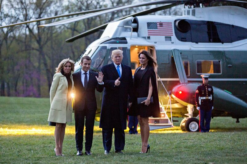 French First Lady Brigitte Macron, French President Emmanuel Macron, US President Donald J Trump and US First Lady Melania Trump stand for photographers in front of Marine One after a dinner at the Mount Vernon estate of first US President George Washington in Mount Vernon, Virginia, USA, on April 23, 2018. Andrew Harrer / EPA