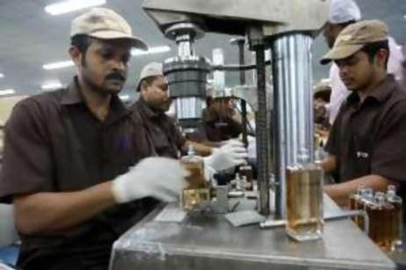 AL SHARJAH - JULY 15,2010 - Workers at Swiss Arabian Perfume Factory in Sharjah. ( Paulo Vecina/The National )