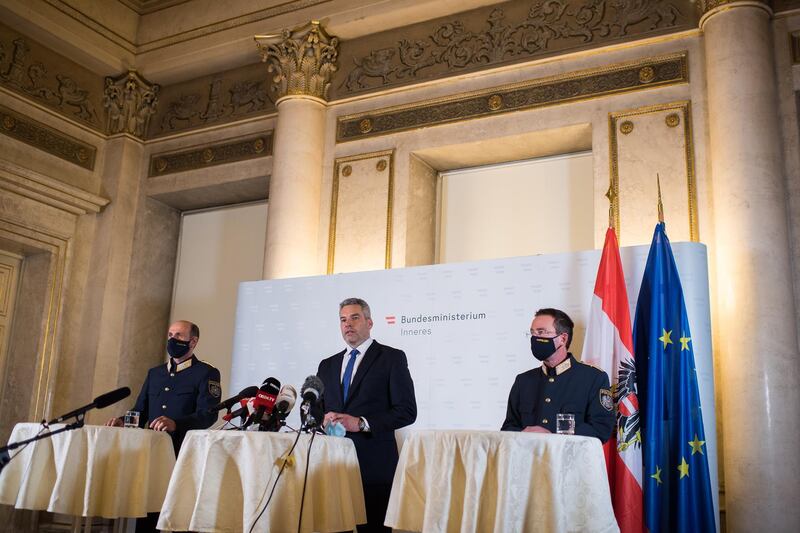 General Director for public safety Franz Ruf, Interior Minister Karl Nehammer and police chief of Vienna Gerhard Puerstl speak at a press conference. Getty Images