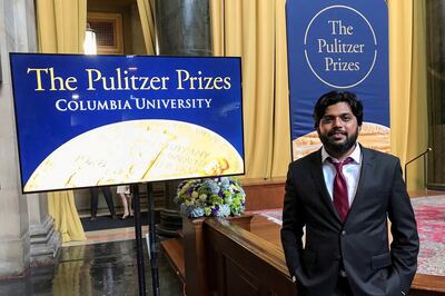 FILE PHOTO: Reuters photographer Danish Siddiqui, who was killed in Afghanistan last year, poses for a picture at Columbia University's Low Memorial Library during the Pulitzer Prize giving ceremony, in New York, U. S. , May 30, 2018.  Picture taken May 30, 2018.  REUTERS 