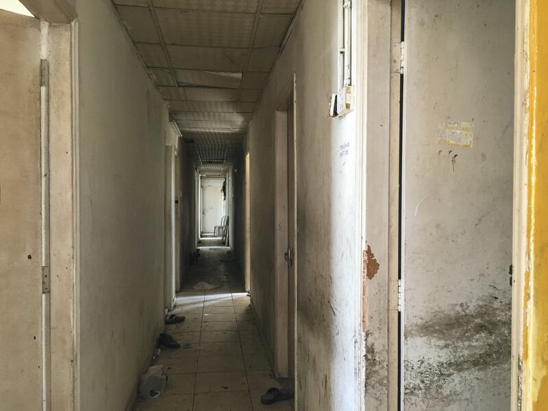 ABU DHABI, UNITED ARAB EMIRATES. 24 September 2017. Abandoned building in Mussafah. (Photo: Antonie Robertson/The National) Journalist: Haneen Dajani. Section: National.