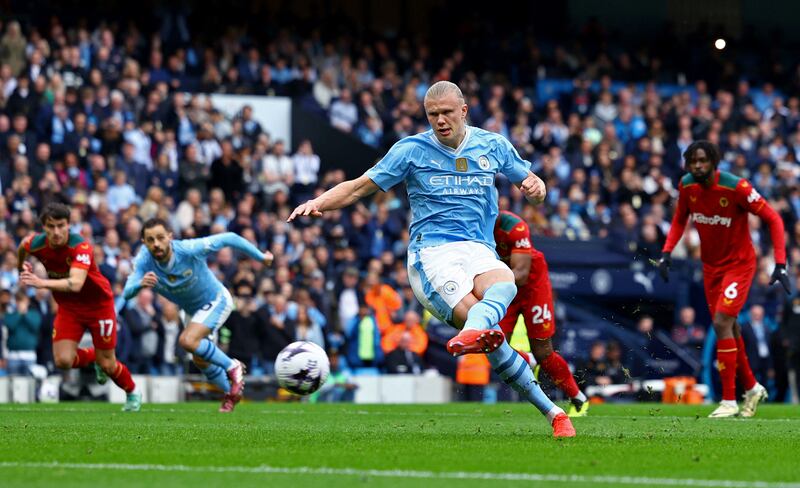Manchester City's Erling Haaland scores their first goal from the penalty spot. Reuters