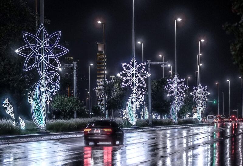 Abu Dhabi, United Arab Emirates, April 15, 2020.  The newly installed Ramadan lights on the Corniche during the rains.Victor Besa / The NationalSection:  NAFor:  Standalone/Stock Images